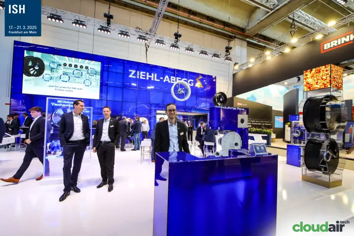 Ziehl-Abegg team in front of the ECblue Technology display at ISH 2025
