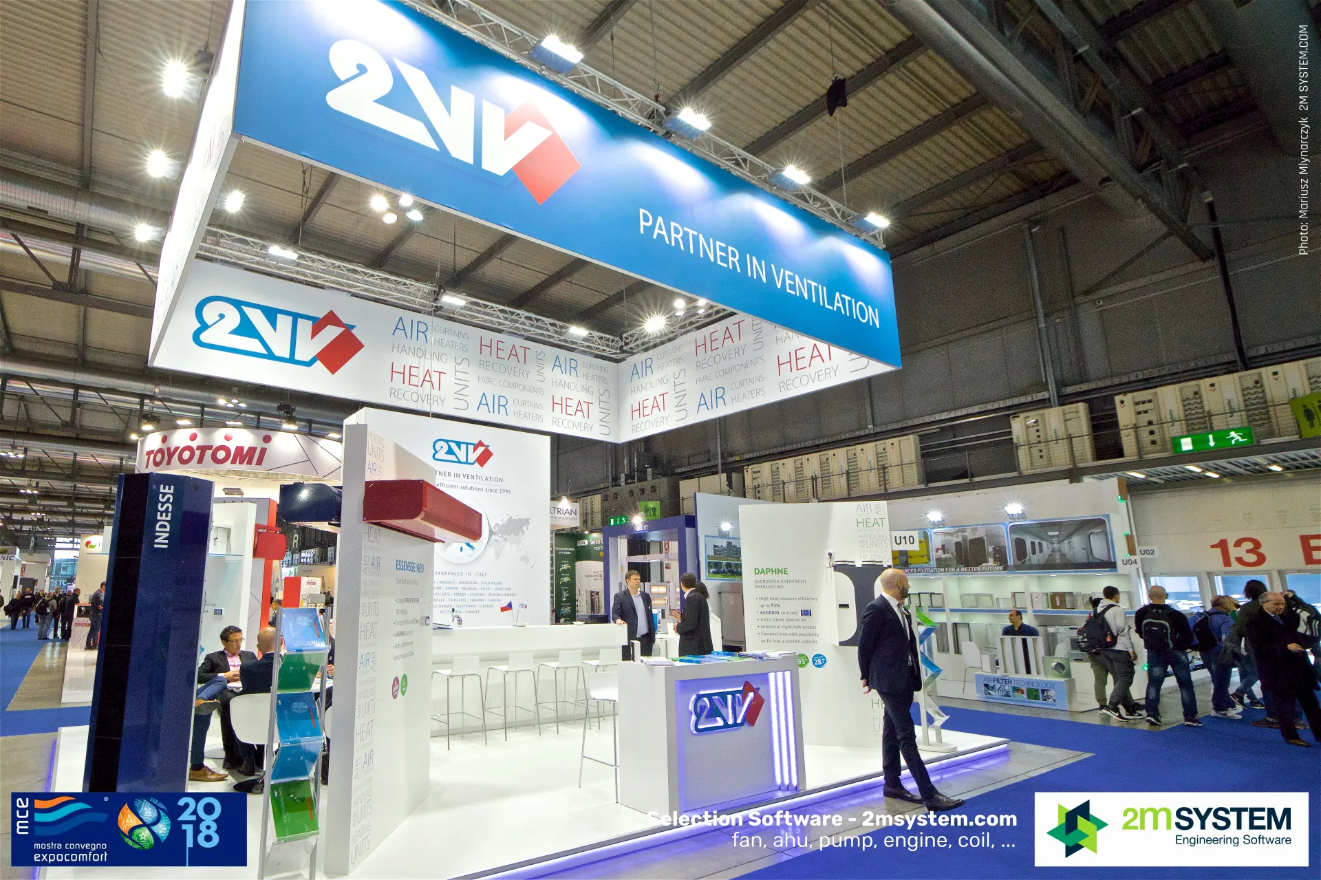 2VV stand under a blue 'Partner in Ventilation' overhead fascia at MCE 2018