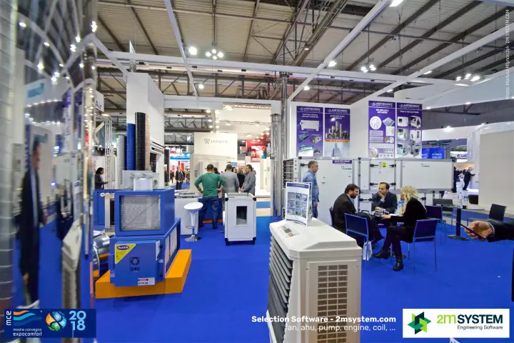 Airtechnic stand seen past an evaporative cooler toward fan boxes at MCE 2018