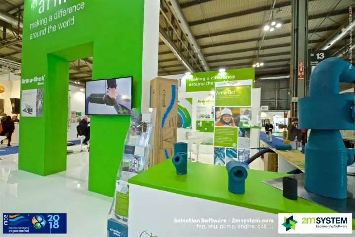 Armacell insulation fittings on a green counter beside an ArmaGel poster at MCE 2018