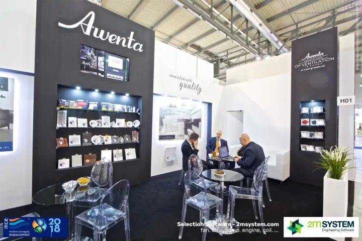 Awenta shelves of boxed fans and grilles beside a meeting table at MCE 2018