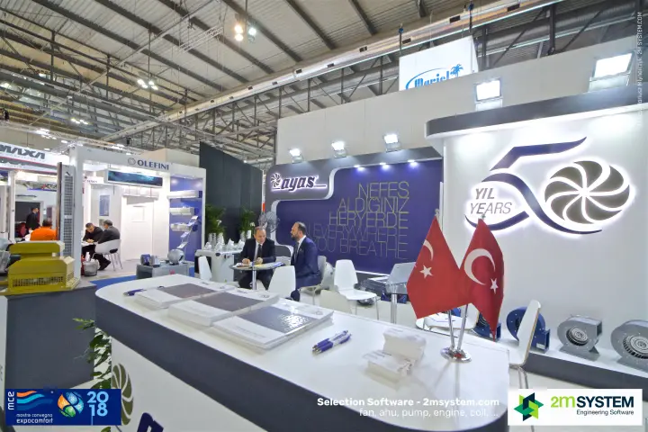 Ayas reception counter with Turkish flags and backlit 50-year logo at MCE 2018