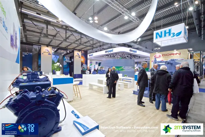 Blue GEA reciprocating compressors on white plinths with NH3 sign at MCE 2018