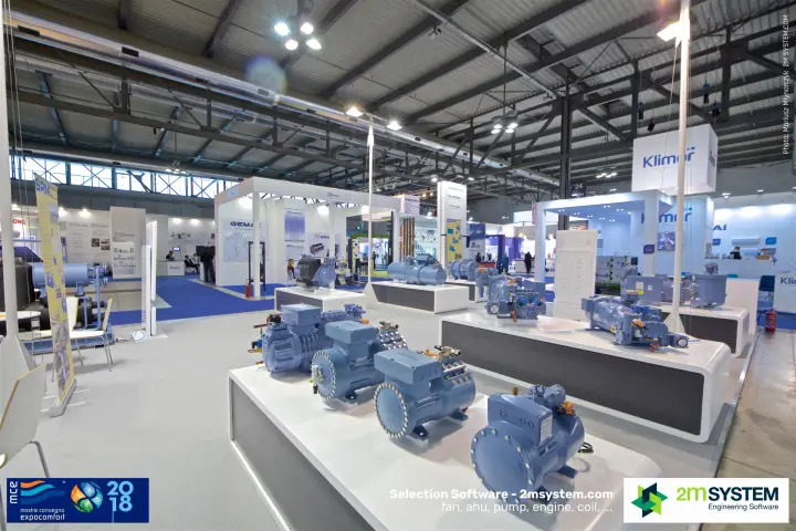 Blue semi-hermetic and screw compressors on white RefComp plinths at MCE 2018