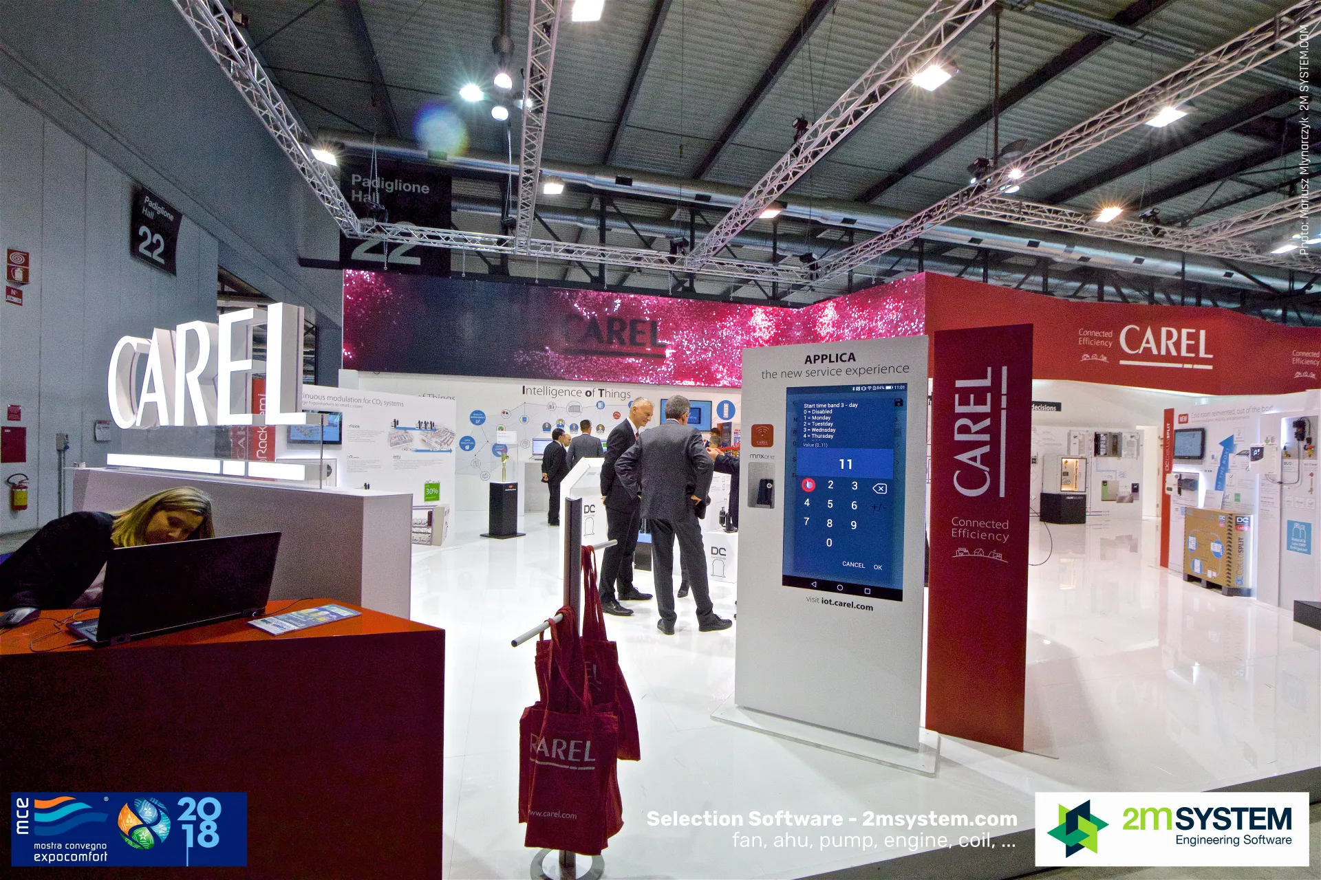 Carel stand entrance with Applica touchscreen kiosk and 3D logo at MCE 2018