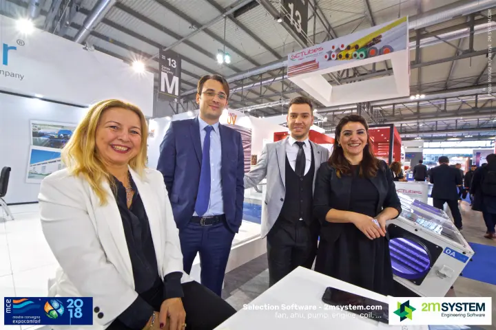 Close group photo of the Impelair stand team
