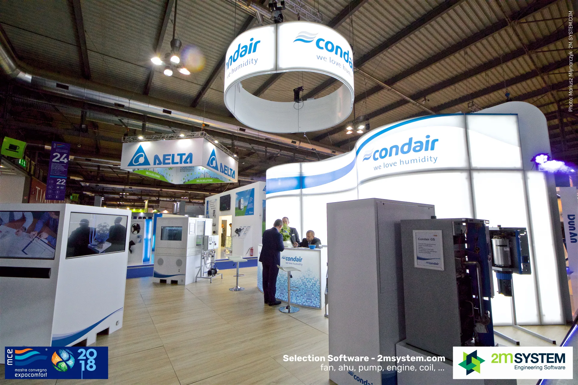 Condair GS humidifier with open casing beside the illuminated curved wall at MCE 2018