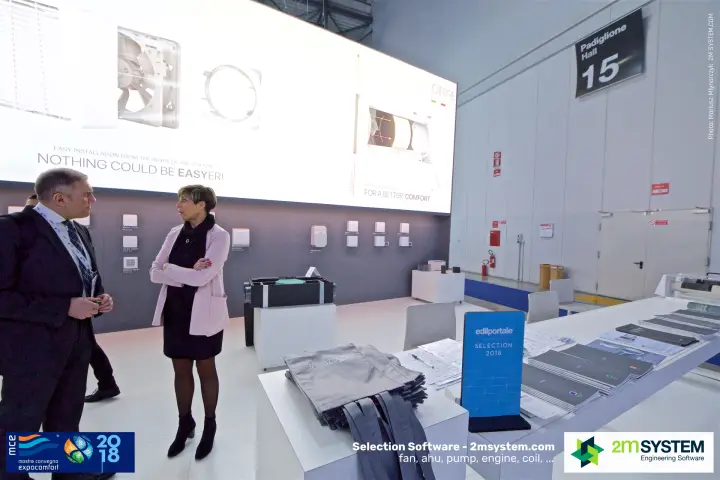 Conversation at the O.Erre stand beside the brochure table in Hall 15 at MCE 2018