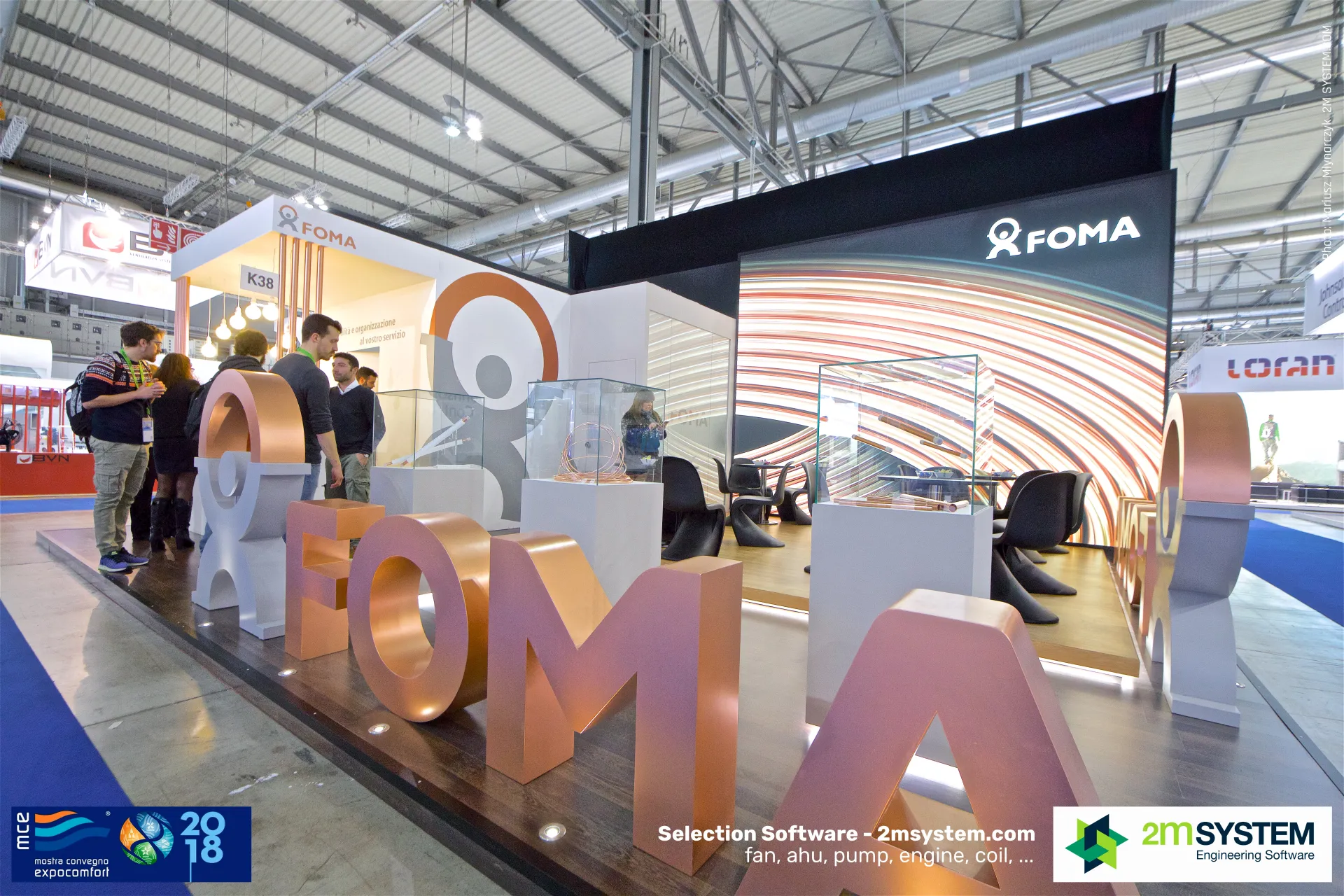 Copper-finished FOMA letters along the front of stand K38 at MCE 2018