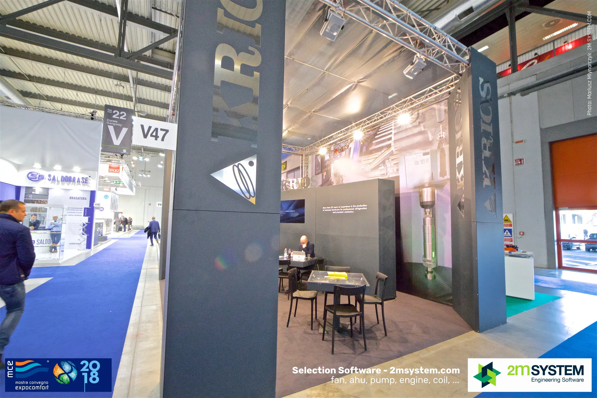 Corner of the Krios stand with metal logo pillars at stand V47 at MCE 2018