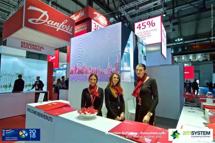 Danfoss welcome counter in front of a large LED video cube at MCE 2018