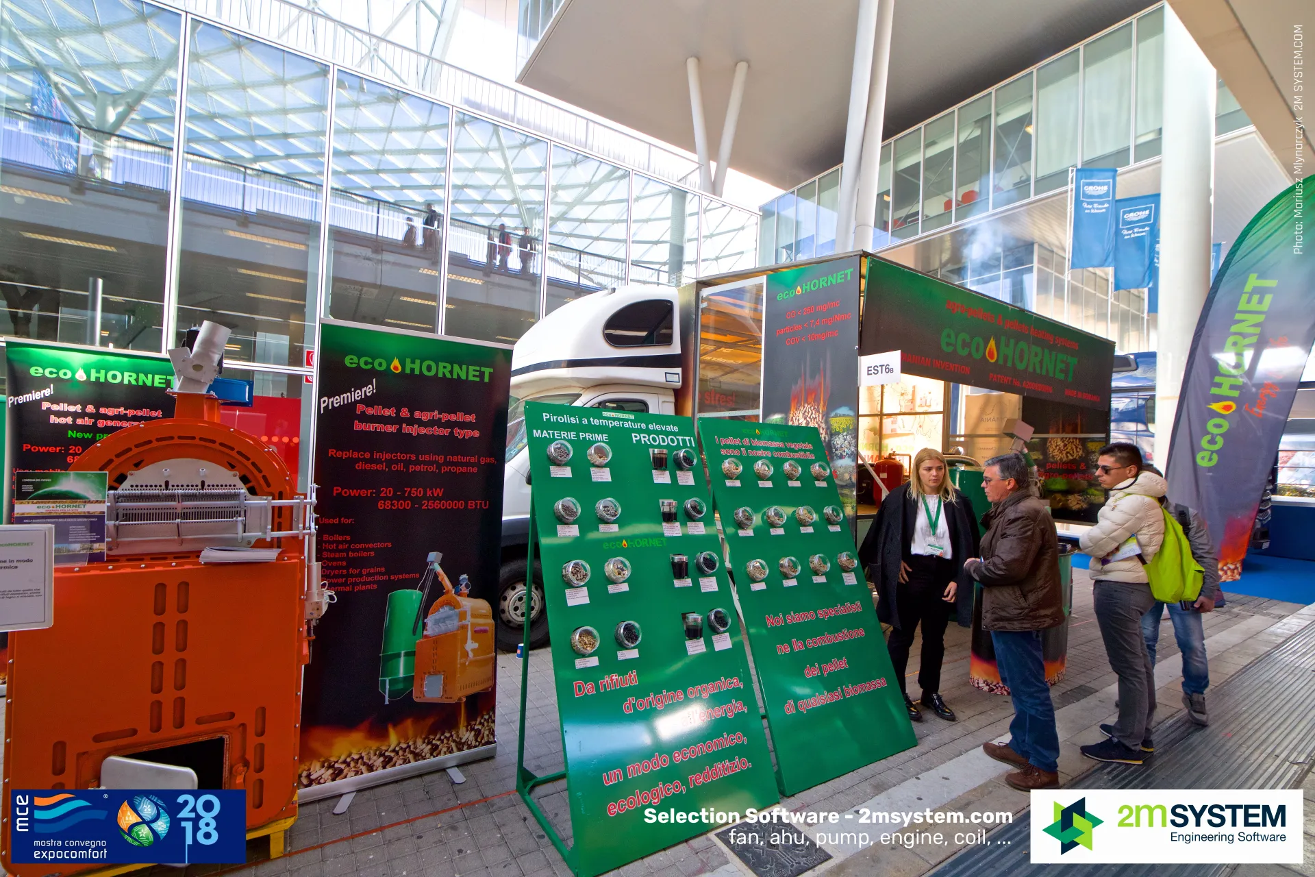 Eco Hornet outdoor stand with pellet burners and biomass sample boards at MCE 2018