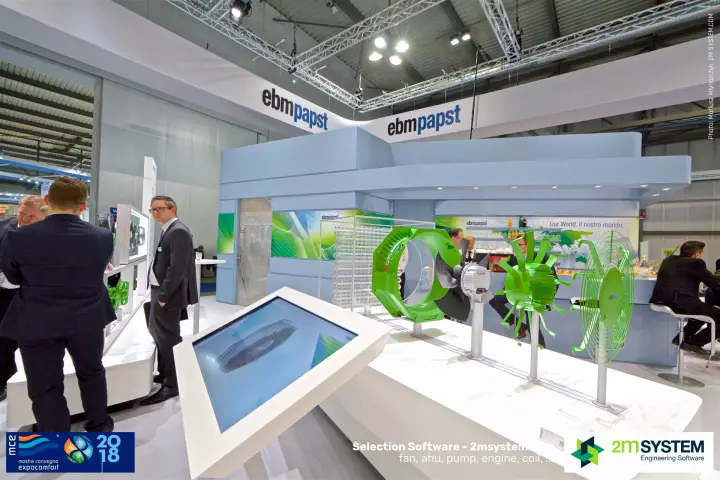 Exploded green axial fan components and touchscreen at ebm-papst at MCE 2018