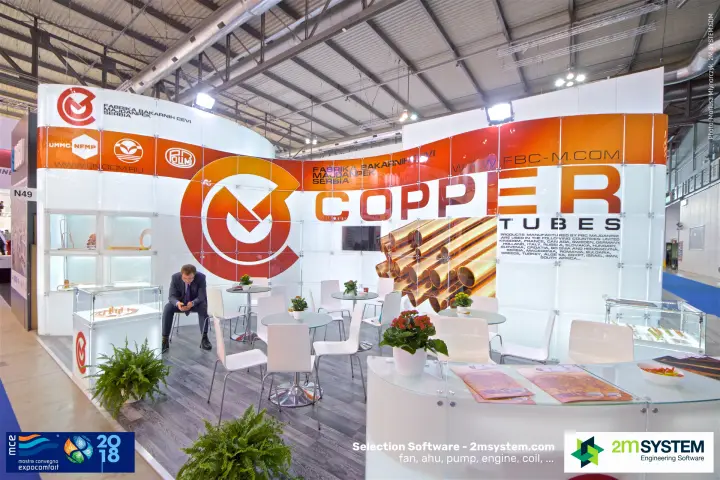 FBC Majdanpek copper tubes stand with orange curved graphics