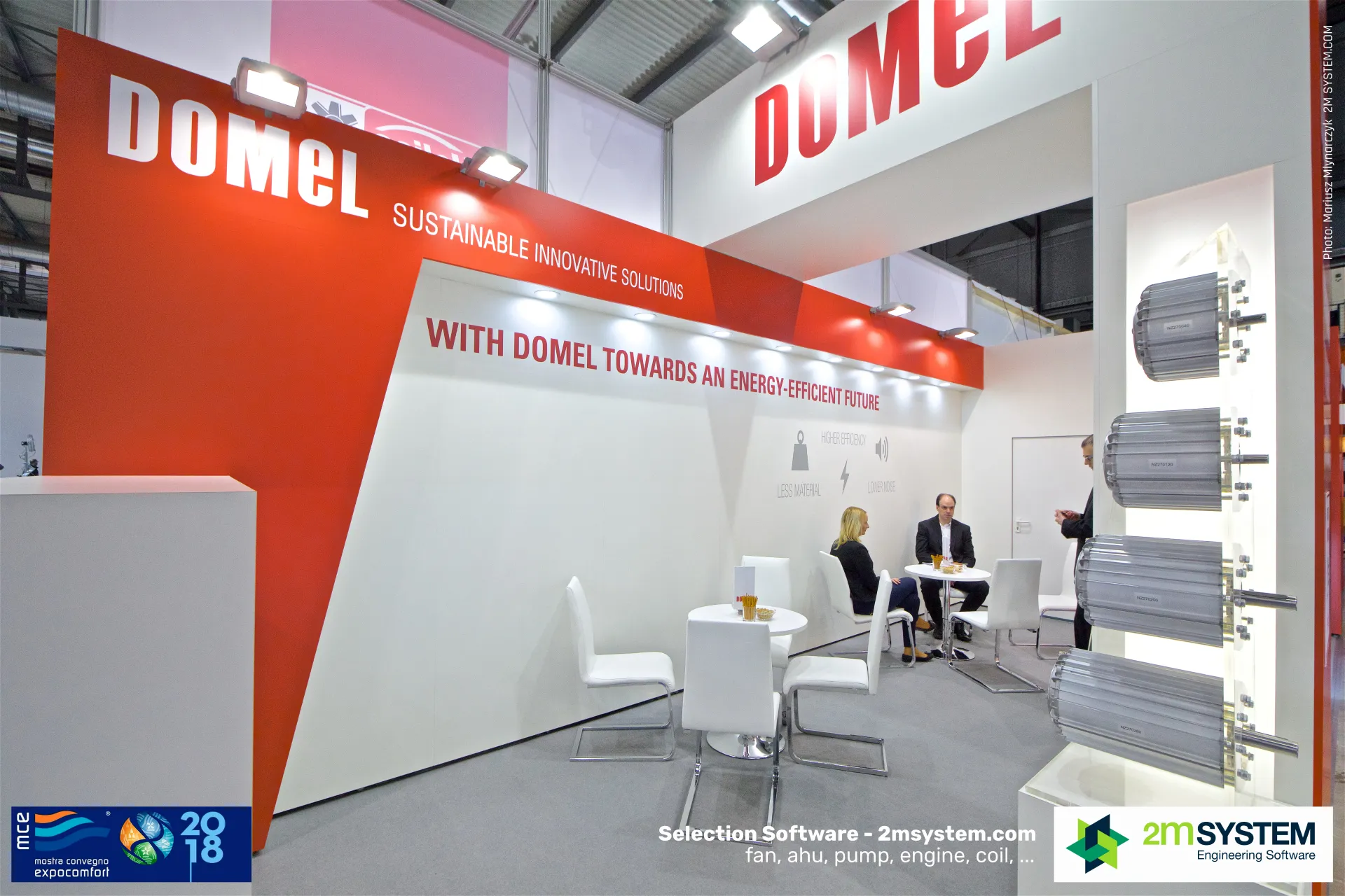 Finned motor housings displayed on a lit column at the Domel stand at MCE 2018