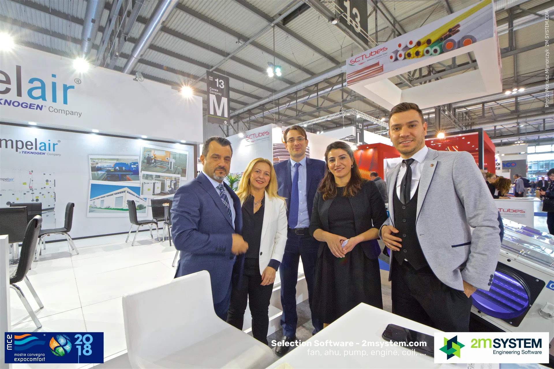 Five-person Impelair team at the stand counter at MCE 2018