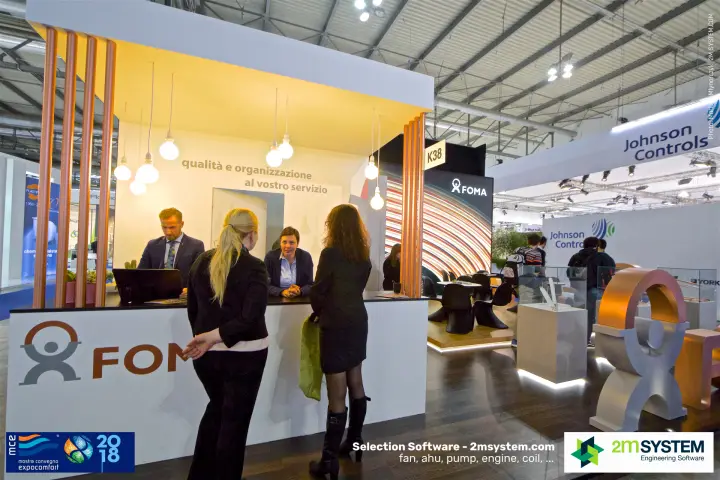 FOMA reception counter under copper pipe columns and pendant bulbs at MCE 2018