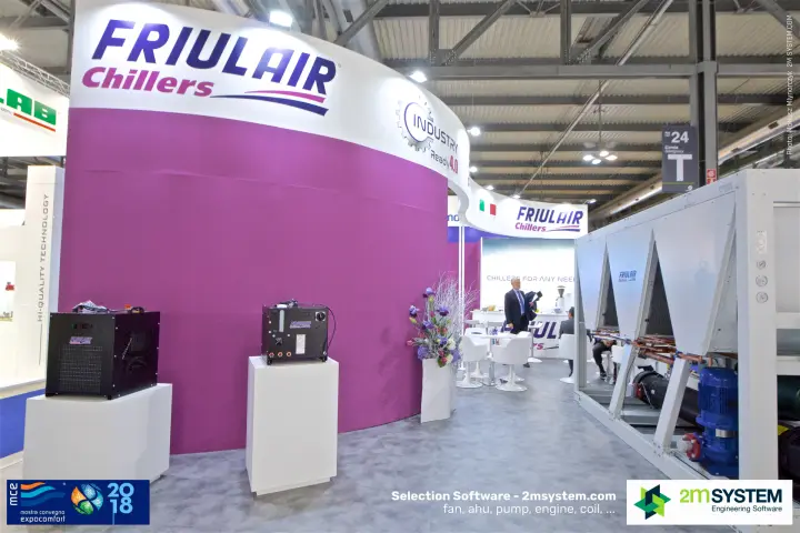 Friulair compact process chillers in front of a curved purple wall
