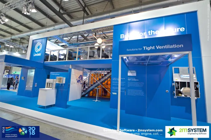 Front view of Lindab's two-storey stand with staircase to upper lounge at MCE 2018
