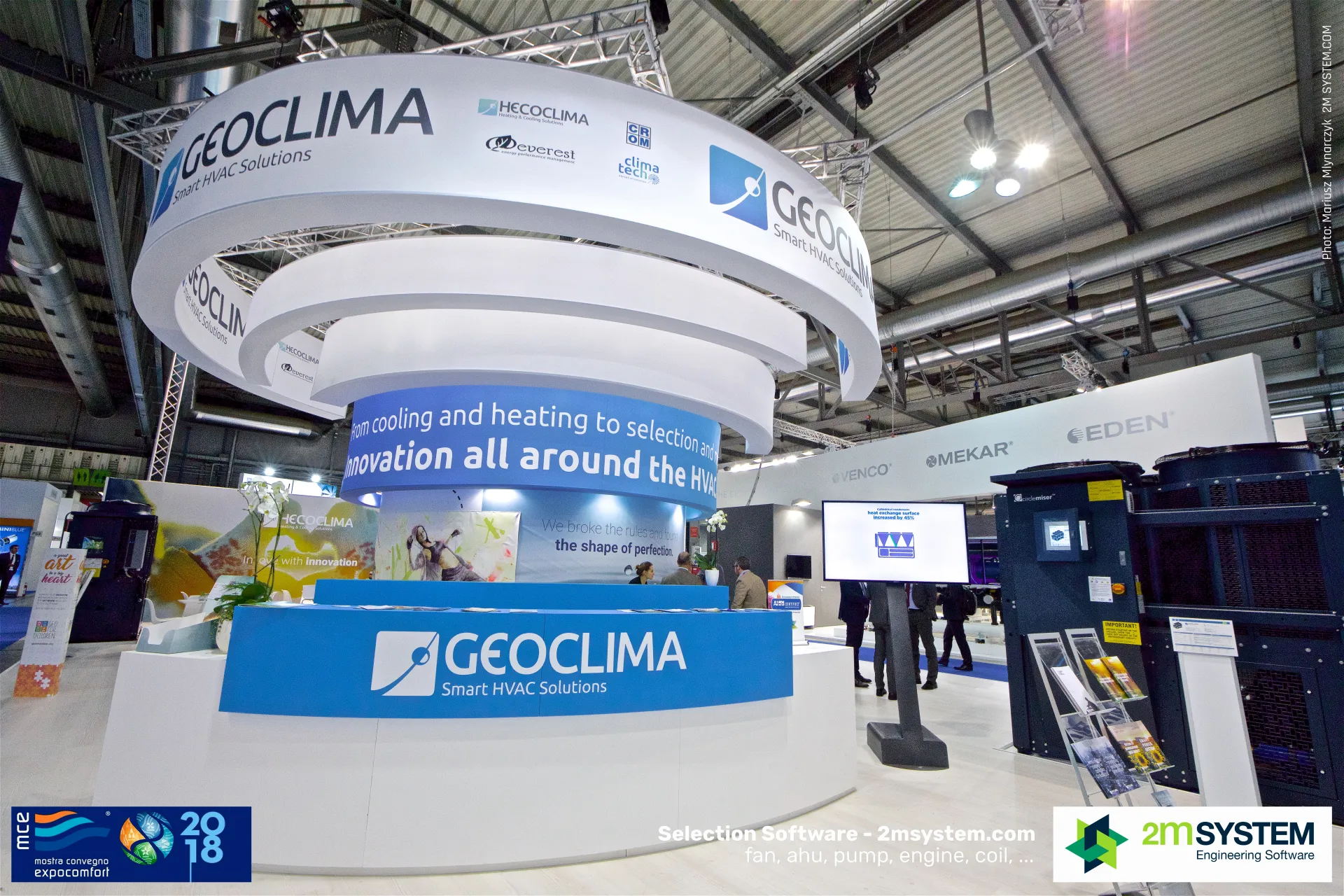 Geoclima reception counter under the spiral "Smart HVAC Solutions" fascia at MCE 2018