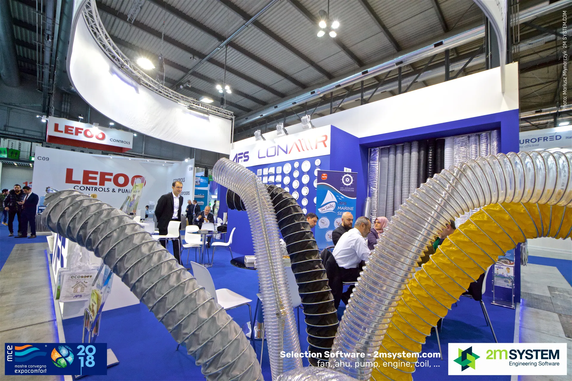Grey, clear, black and yellow flexible hoses on the AFS stand at MCE 2018