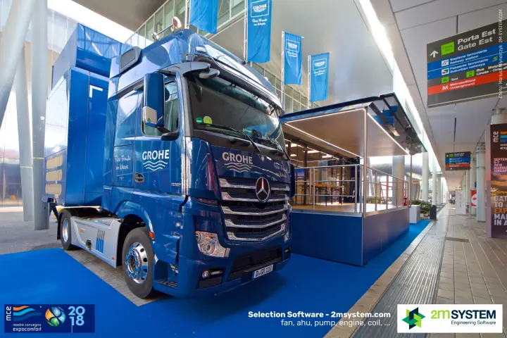 Grohe roadshow truck with 'Pure Freude an Wasser' livery and fold-out stage at MCE 2018