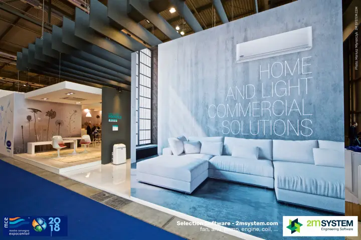 "Home and Light Commercial Solutions" graphic with a split unit over a sofa at MCE 2018