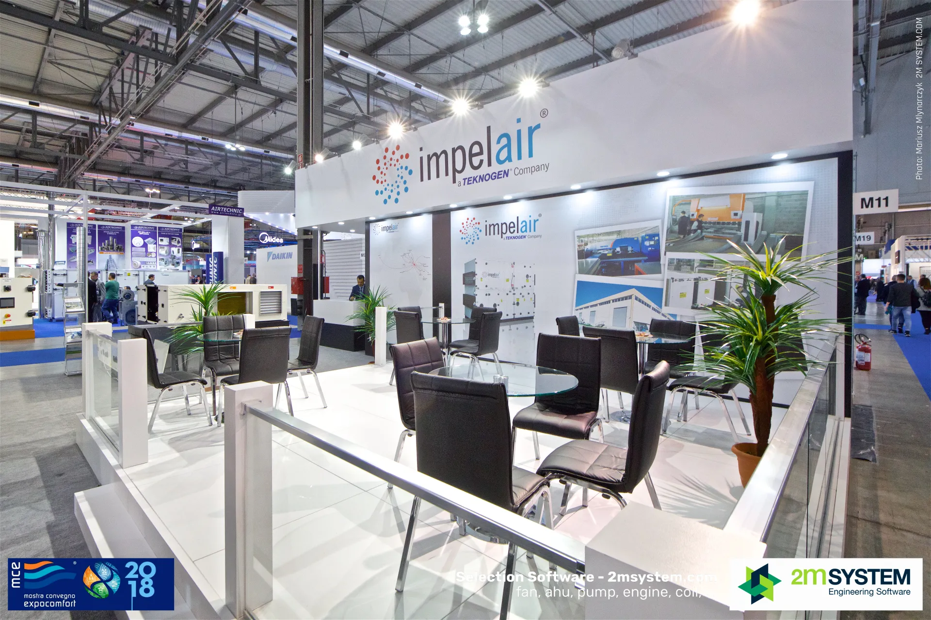 Impelair raised meeting area with black chairs and glass rail at MCE 2018