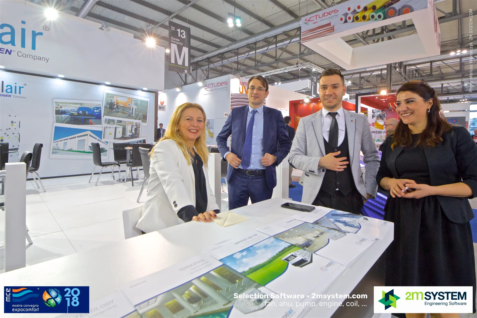 Impelair team at the counter with product brochures at MCE 2018
