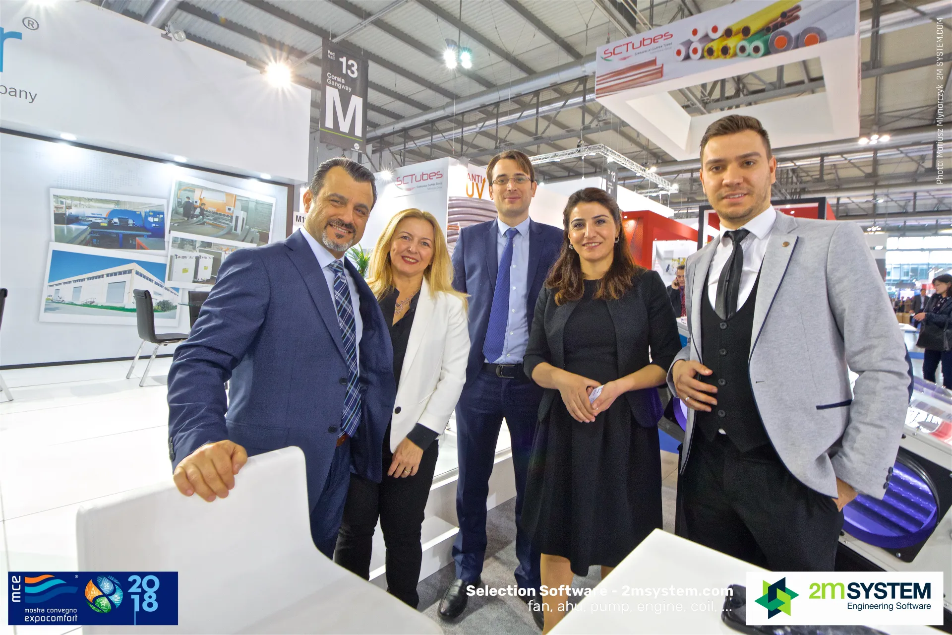 Impelair team group photo in front of factory photographs at MCE 2018