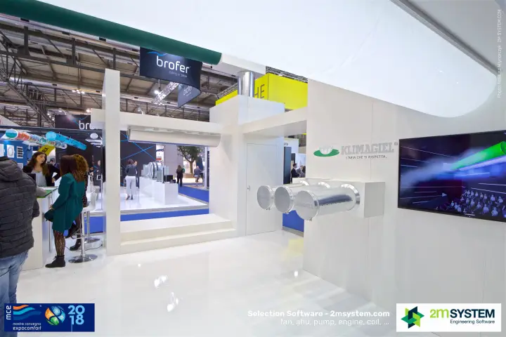 Klimagiel stand with metal air diffusers and a green textile duct overhead at MCE 2018
