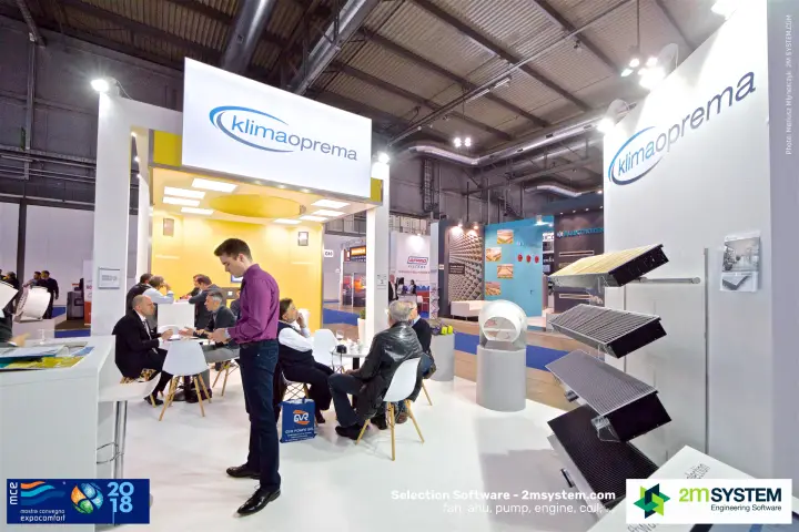 Klimaoprema stand with tilted floor grille samples and a yellow meeting zone