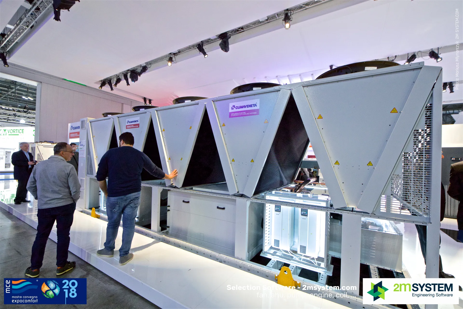 Large Climaveneta air-cooled unit with V-shaped coils and lit drive bay at MCE 2018