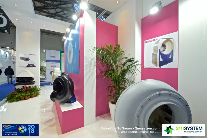 Large grey plastic fan housing beside a Venplast poster at MCE 2018