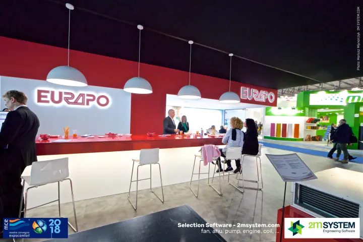Long red Eurapo bar with illuminated logos and pendant lamps