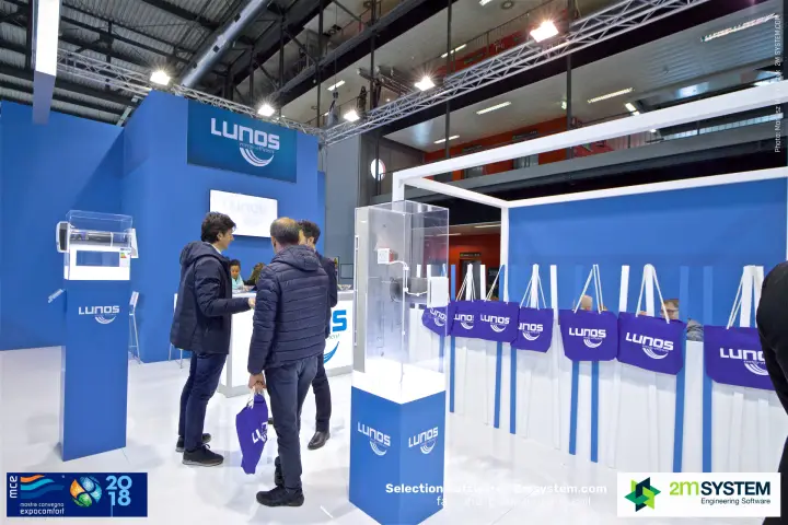 Lunos stand with branded purple bags and wall ventilation units