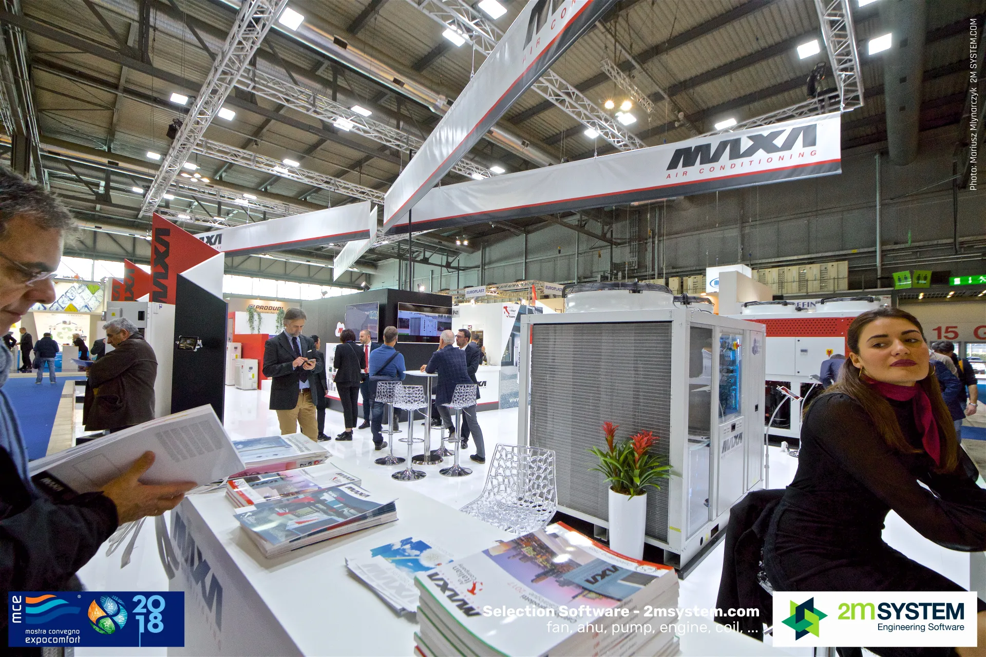 Maxa reception desk with brochures in front of an air-cooled chiller at MCE 2018