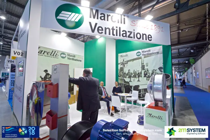 Meeting table at the Marelli Ventilazione stand behind galvanised fans