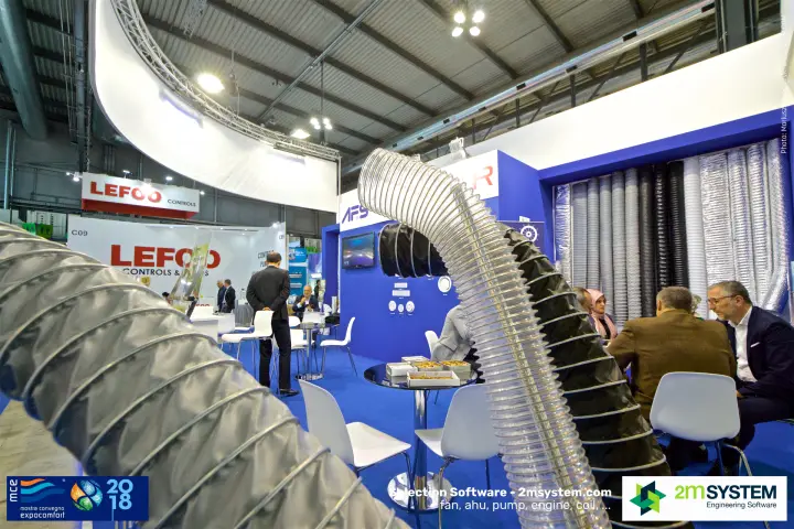 Meeting tables on the AFS stand framed by flexible hoses