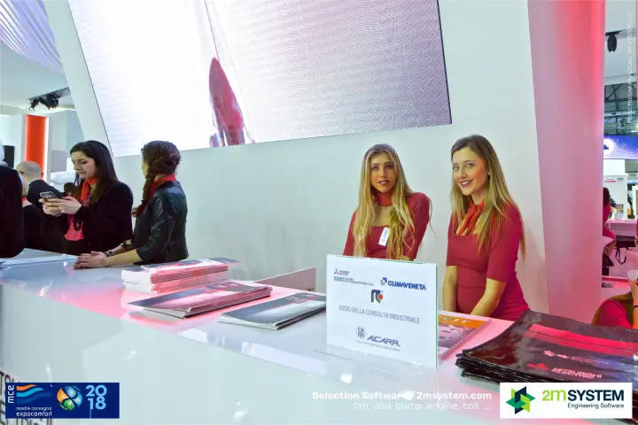 Mitsubishi Electric front desk with AiCARR membership sign and brochures at MCE 2018