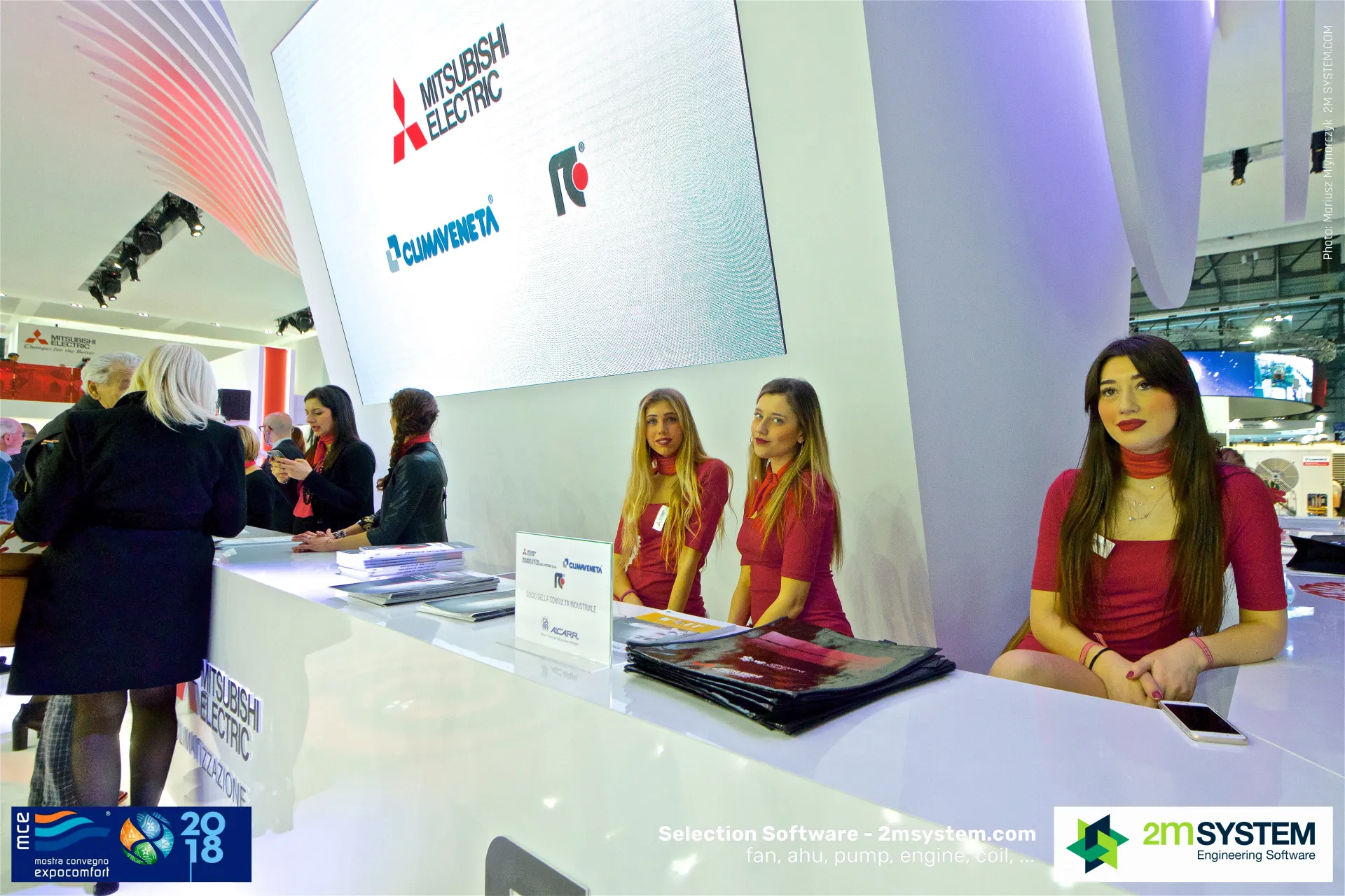 Mitsubishi Electric reception desk under a screen with Climaveneta and RC logos at MCE 2018