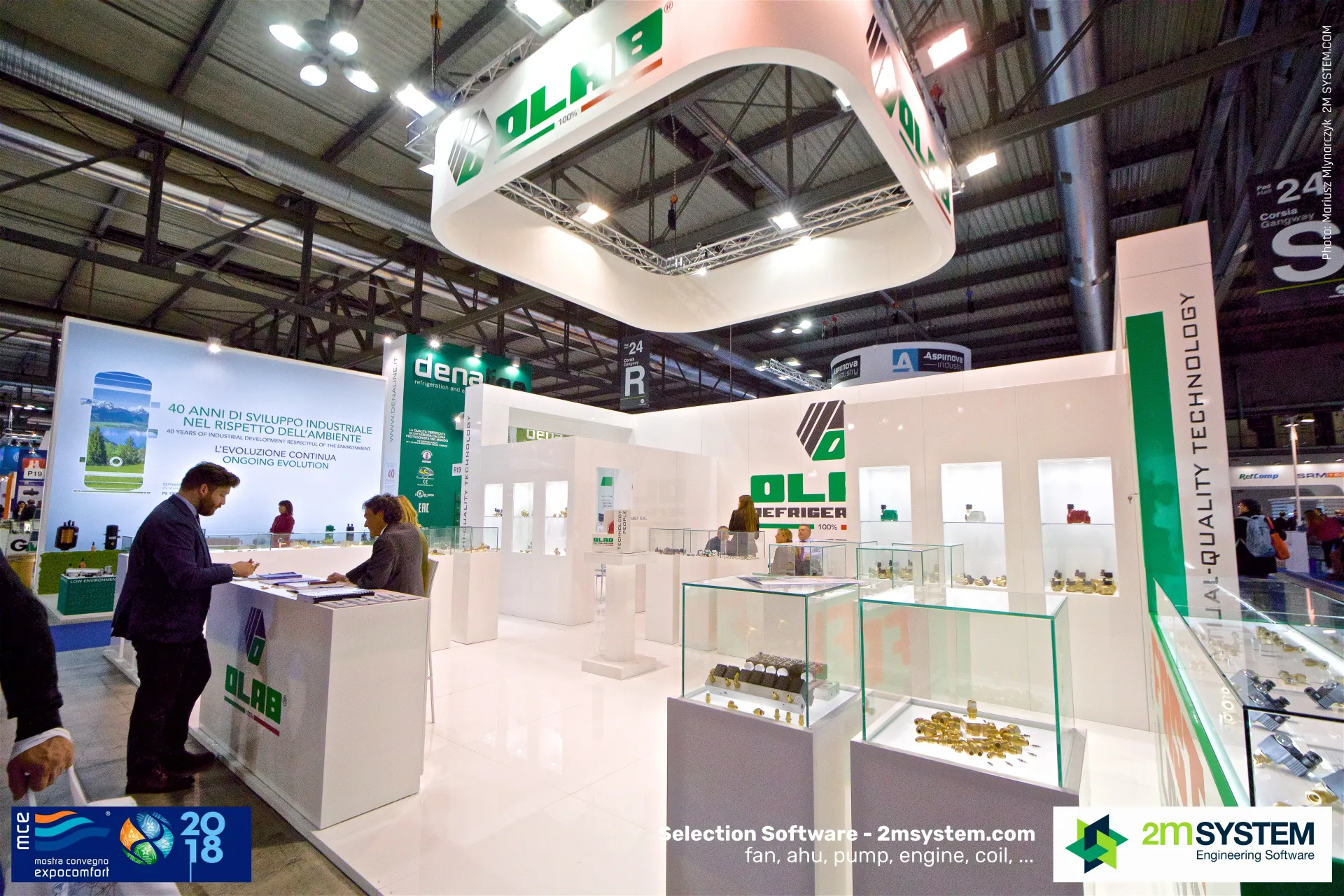 Olab stand with suspended logo ring and glass cases of valves at MCE 2018