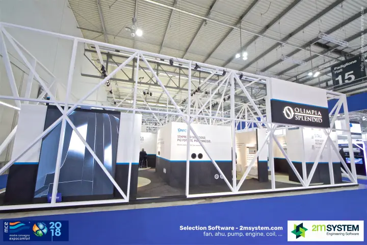 Olimpia Splendid stand framed by a white steel truss in Hall 15 at MCE 2018
