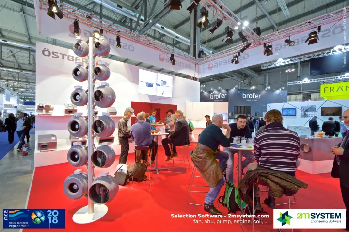 Östberg stand with a tower of grey circular duct fans and red carpet