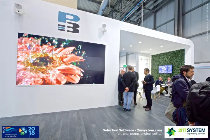 P3 stand with a nine-panel video wall and a green plant wall