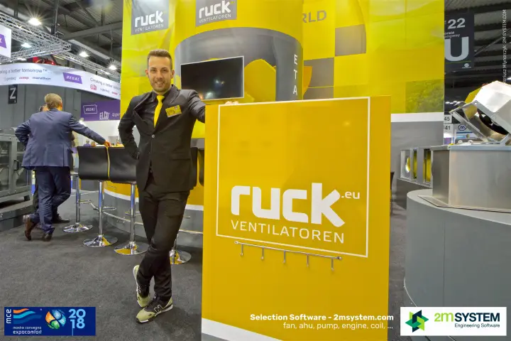 Portrait at the Ruck stand next to the branded ruck.eu sign at MCE 2018