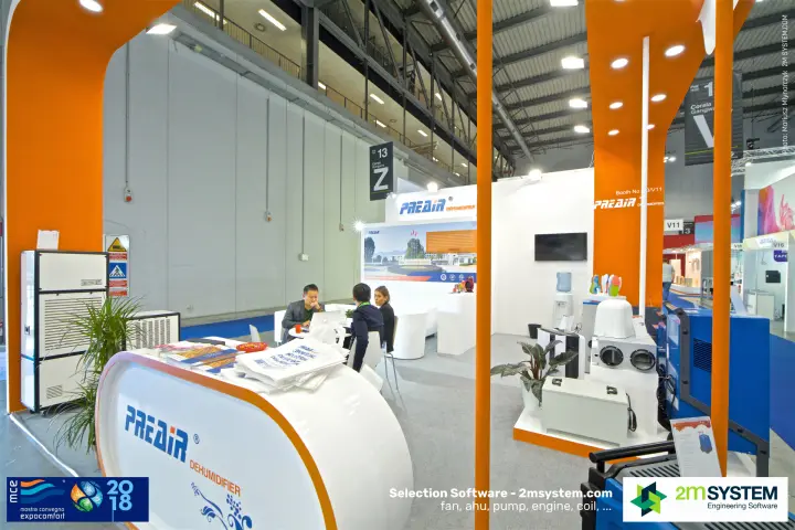Preair dehumidifier stand with orange arches and curved reception desk at MCE 2018