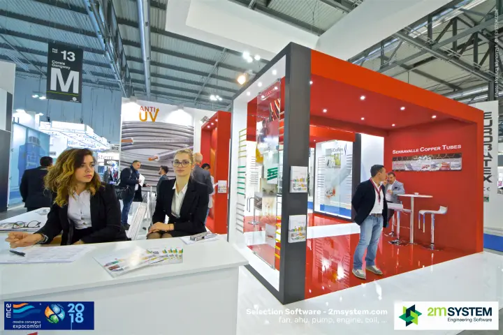 Red SCTubes meeting cube with 'Serravalle Copper Tubes' signage at MCE 2018