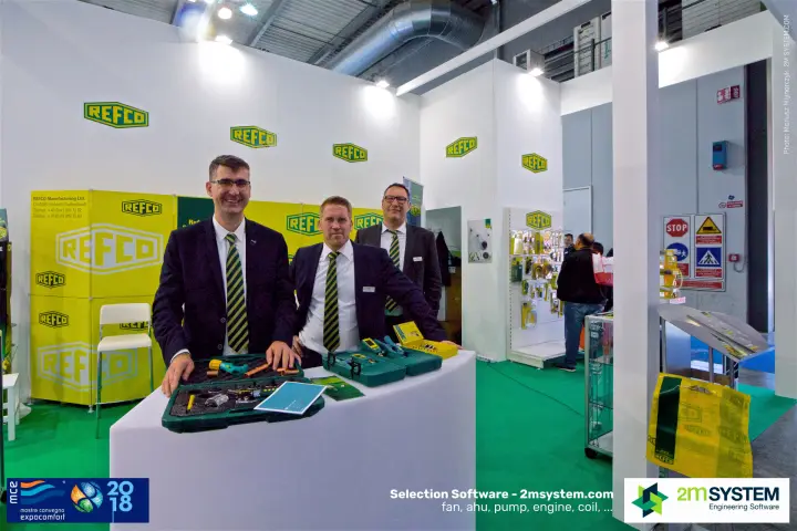 Refco team behind a counter with refrigeration tool cases at MCE 2018