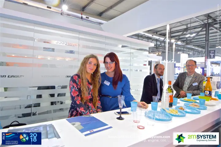 RefComp team at the bar counter with brochures and refreshments at MCE 2018